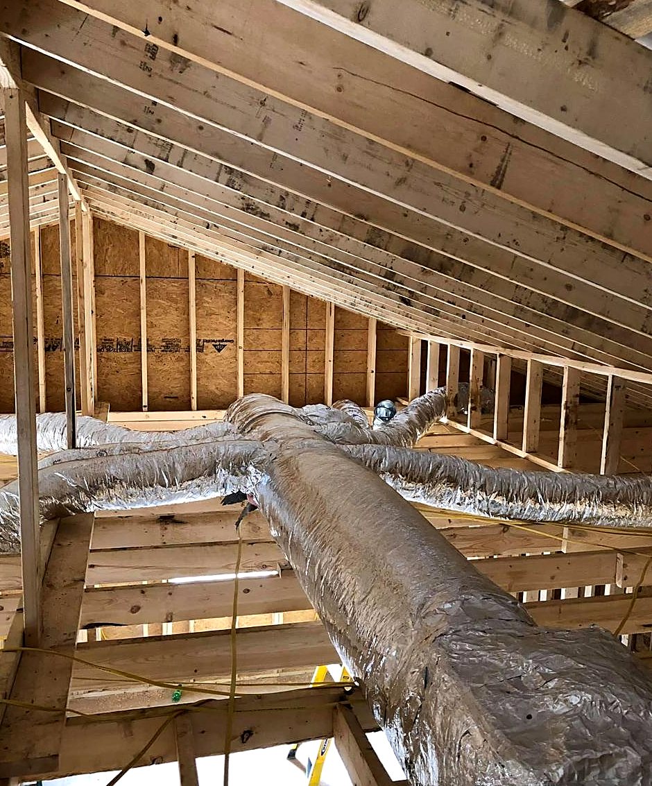 Branch duct runs installed through new attic framing