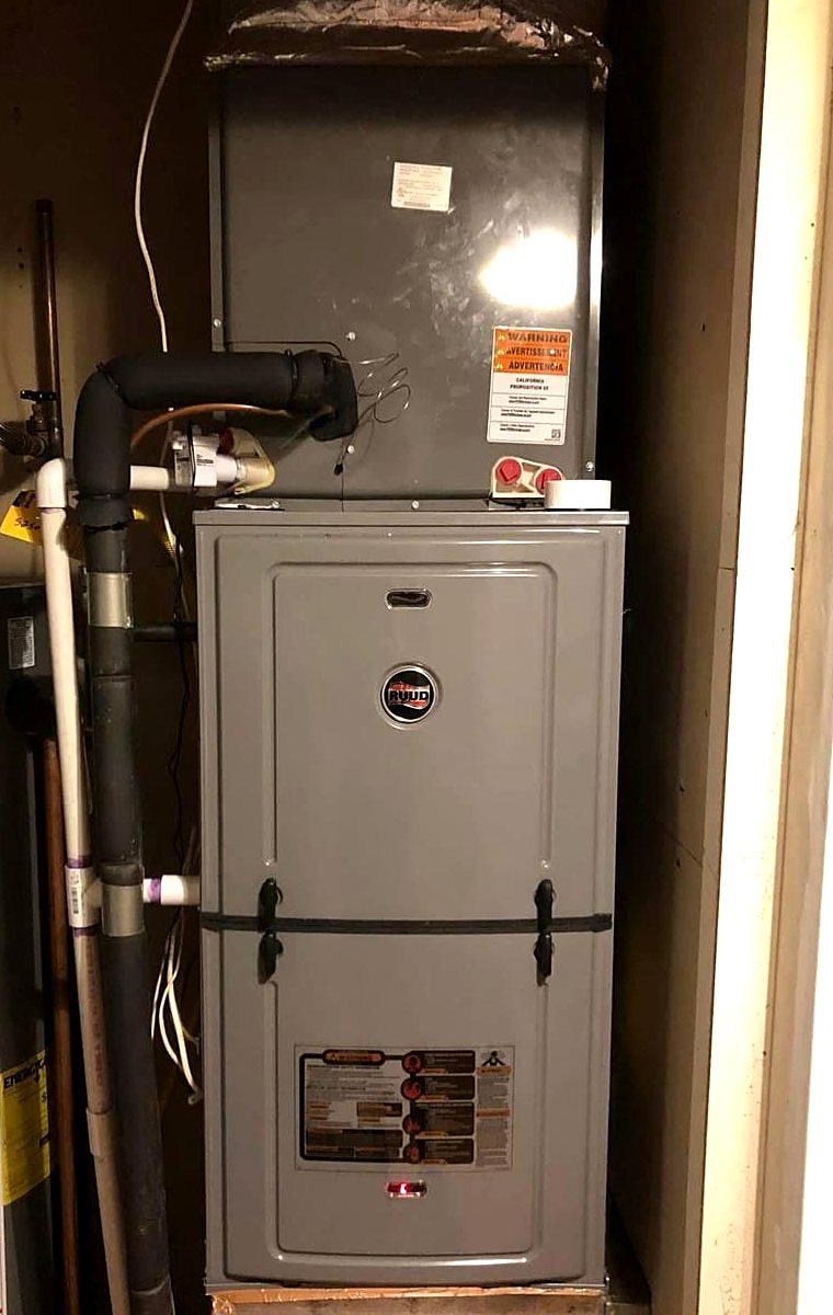 Indoor furnace installed in a utility closet
