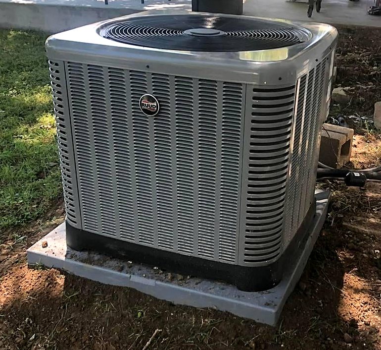 Clean Ruud outdoor unit installed at a Harrison area home