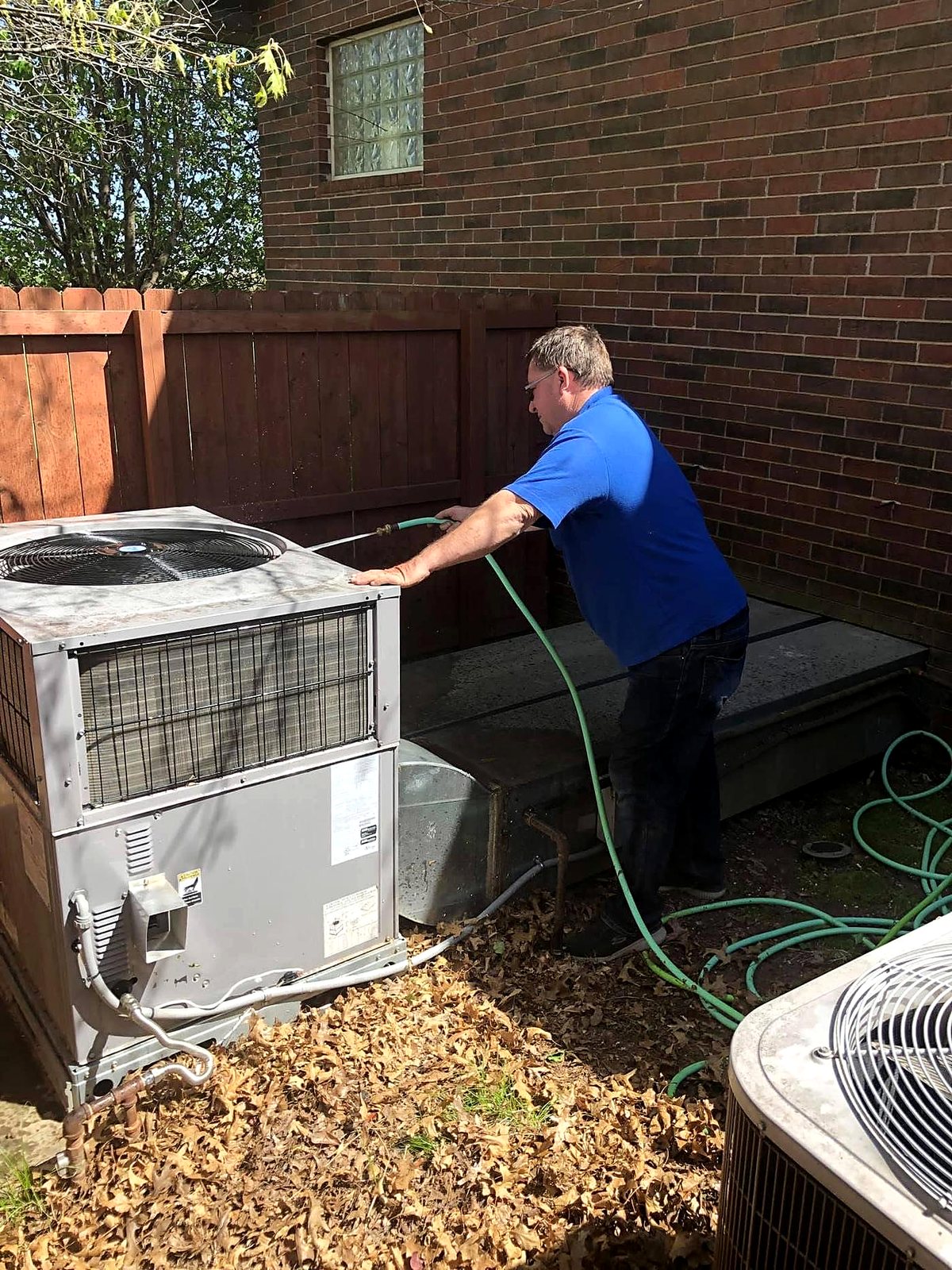 Owner Rob Collins servicing a system at a local home